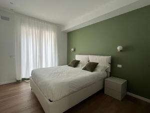 Letto o letti in una camera di Villa Silvia Apartments