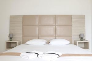 Postel nebo postele na pokoji v ubytování Imperial Hotel