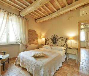 Katil atau katil-katil dalam bilik di Pamperduto Country Resort