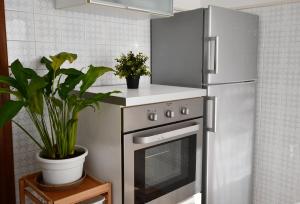 Η κουζίνα ή μικρή κουζίνα στο Lo Scorcio sul Mare Apartment