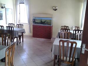 Restoran või mõni muu söögikoht majutusasutuses Tandem Guesthouse