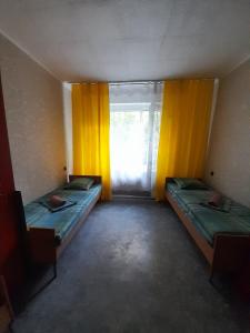 Postel nebo postele na pokoji v ubytování Eva Hostel