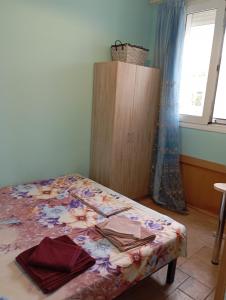 Postel nebo postele na pokoji v ubytování Κορινθιακός