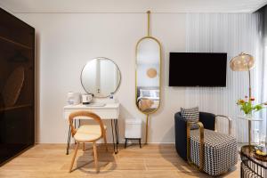 a living room with a mirror and a desk at Allenbeach TLV- apart Hotel- Adults only in Tel Aviv