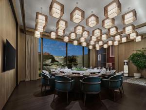TV a/nebo společenská místnost v ubytování Banyan Tree Suzhou Shishan
