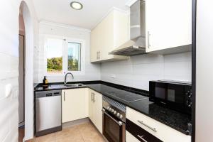 Kuchyň nebo kuchyňský kout v ubytování Bonito adosado en las rotas (Denia)