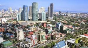 una vista aérea de una ciudad con edificios altos en Hotel Dream World Araneta Cubao, en Manila