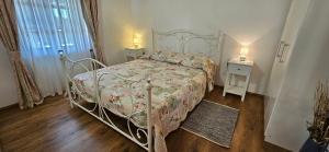 Postel nebo postele na pokoji v ubytování Apartments Vesna & Mario with pool