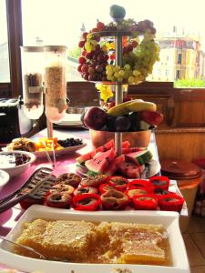 a table topped with lots of different types of food at Esans Hotel - Special Category in Istanbul