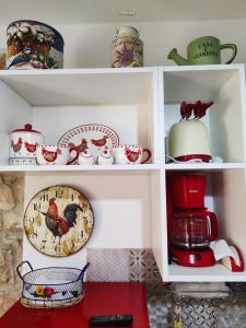 A kitchen or kitchenette at Dommu de Nannai Moro: Appartamento con terrazza