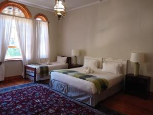 Postel nebo postele na pokoji v ubytování Albert House Guesthouse