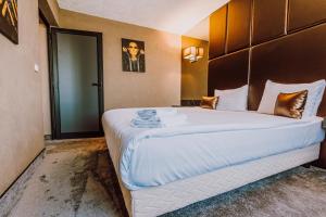 Postel nebo postele na pokoji v ubytování HOTEL CIAO + 10 fotografií
