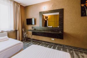 Postel nebo postele na pokoji v ubytování HOTEL CIAO