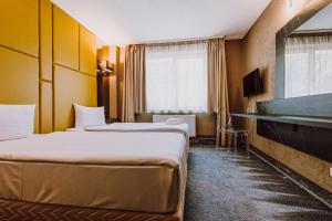 Postel nebo postele na pokoji v ubytování HOTEL CIAO