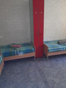 Postel nebo postele na pokoji v ubytování Eva Hostel