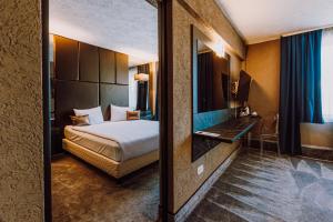 Postel nebo postele na pokoji v ubytování HOTEL CIAO