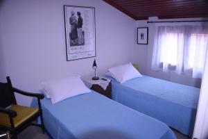 Postel nebo postele na pokoji v ubytování Kallikratia Holiday Flat 1