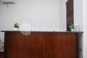 Certificato, attestato, insegna o altro documento esposto da Tatti Inn Syariah Seturan RedPartner