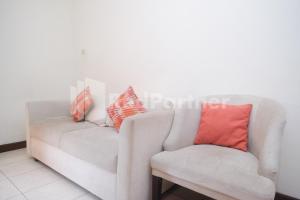 Area soggiorno di Tatti Inn Syariah Seturan RedPartner