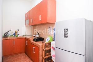 Cucina o angolo cottura di Tatti Inn Syariah Seturan RedPartner