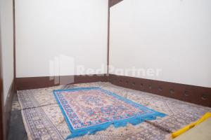 Letto o letti in una camera di Tatti Inn Syariah Seturan RedPartner