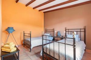 Postel nebo postele na pokoji v ubytování Villa Tijuana - Jacuzzi, Playa y Naturaleza en Gran Canaria