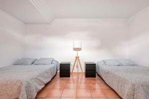 Postel nebo postele na pokoji v ubytování Villa Tijuana - Jacuzzi, Playa y Naturaleza en Gran Canaria