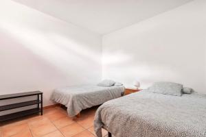 Postel nebo postele na pokoji v ubytování Villa Tijuana - Jacuzzi, Playa y Naturaleza en Gran Canaria
