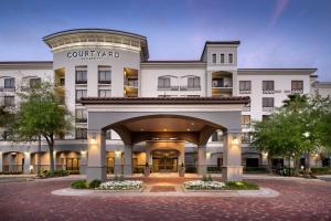 a rendering of the front of a hotel at Courtyard by Marriott Sandestin at Grand Boulevard in Destin