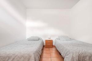 Postel nebo postele na pokoji v ubytování Villa Tijuana - Jacuzzi, Playa y Naturaleza en Gran Canaria