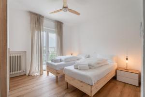 Ένα ή περισσότερα κρεβάτια σε δωμάτιο στο Nina's Home