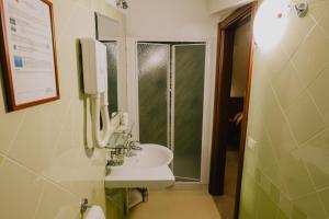 Baðherbergi á Hotel Nilde