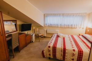 Sjónvarps- og/eða afþreyingartæki á Hotel Nilde