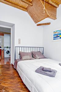 Postel nebo postele na pokoji v ubytování La Bella Pietra