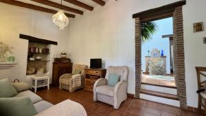 TV a/nebo společenská místnost v ubytování Cortijo El Majito