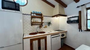 Kuchyň nebo kuchyňský kout v ubytování Cortijo El Majito + 14 fotografií