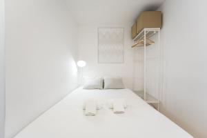 Postel nebo postele na pokoji v ubytování GuestReady - Modern Duplex in Fontainhas