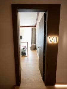 Postel nebo postele na pokoji v ubytování MiraVita Boutique Hotel - Adults Only