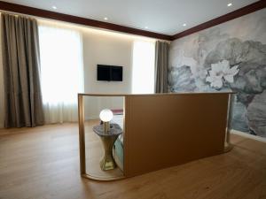 TV a/nebo společenská místnost v ubytování MiraVita Boutique Hotel - Adults Only