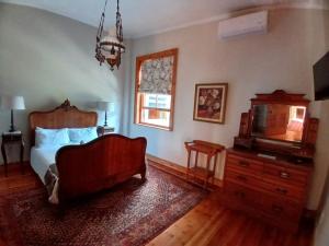 TV a/nebo společenská místnost v ubytování Albert House Guesthouse + 16 fotografií