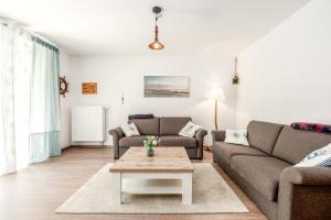Ein Sitzbereich in der Unterkunft Sellinkoje in Residenz Waldidyll