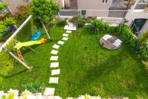Zahrada ubytování Apartments Regjo