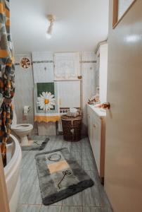 Ένα μπάνιο στο Βίλα Αντώνης