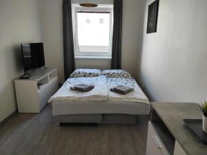 Postel nebo postele na pokoji v ubytování Apartmán Dagmar
