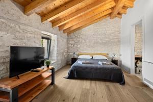 Voodi või voodid majutusasutuse Casa 42 pet friendly for 9 people in Central Istria with salt - water pool toas