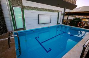 Bazén v ubytování ERGÜN OTEL nebo v jeho okolí + 32 fotografií