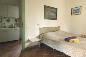 เตียงในห้องที่ Il Piccolo Principe Residenze Gattopardu