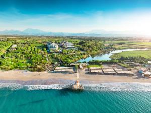 an aerial view of a resort on a beach at Port Nature Luxury Resort in Belek