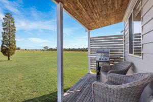En have udenfor Madigan Cottages - The Kookaburra Cottage + 16 billeder