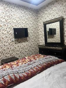 En eller flere senge i et værelse på One bedroom Apartment
